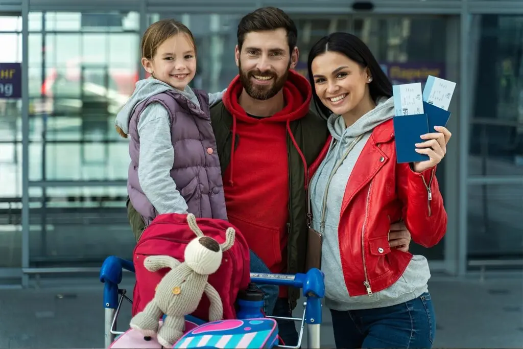 Happy Family with Approved Travel Visa at Airport